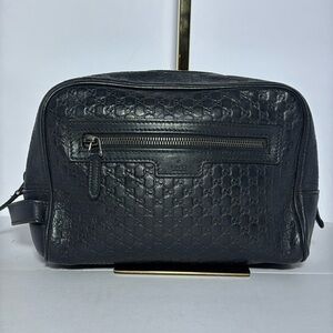 GUCCI DOP KIT IN BLACK GG LEATHER